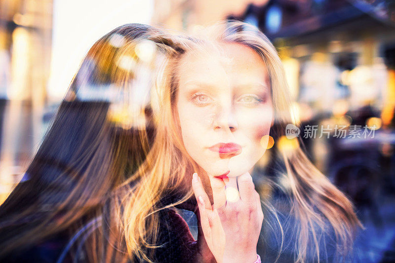 Double exposure portrait of two young women
